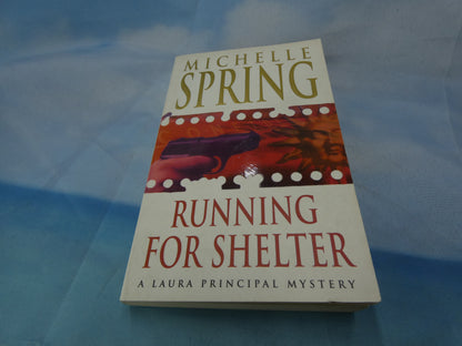 Running For Shelter (A Laura Principal mystery)-Michelle Spring + Free Postage
